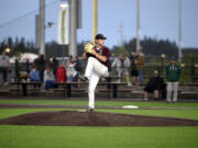 Ridgefield’s Nick Alder winds up before throwing a pitch during the Raptors’ season-opening exhibition game against the Cowlitz Black Bears on Thursday, June 1, 2023, at Ridgefield Outdoor Recreation Complex.