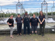 Rian Sallee, at right, the new director of Washington's southwest region, poses with employees of the Goldendale Hatchery during a recent tour. Sallee originally comes from the Midwest, and brings with her a strong conservation background.