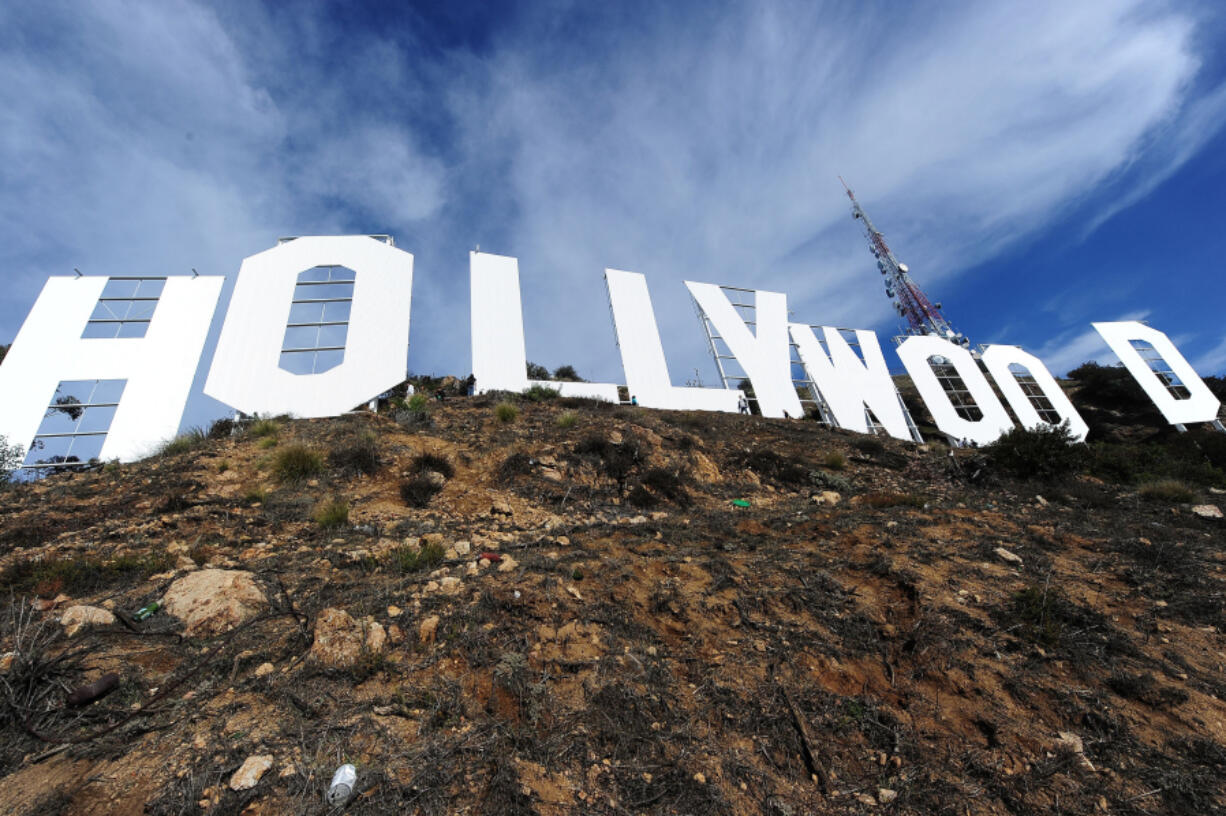 The freshly painted Hollywood sign is seen after a press conference to announce the completion of the famous landmark's major makeover in 2012, in Hollywood, Calif.