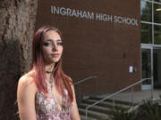 Seattle Student Union Executive Board member Noir Goldberg, 17, a junior at Ballard High School, is pictured outside Ingraham High School, where a student was shot and killed last fall, following a press conference announcing the launch of Reach Out Seattle.