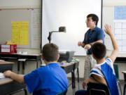 Adam Joy teaches summer school at Hough Elementary School in Vancouver in 2007. The Vancouver School of Arts and Academics science teacher died over the weekend in a crash with a pickup while bicycling in Oregon.