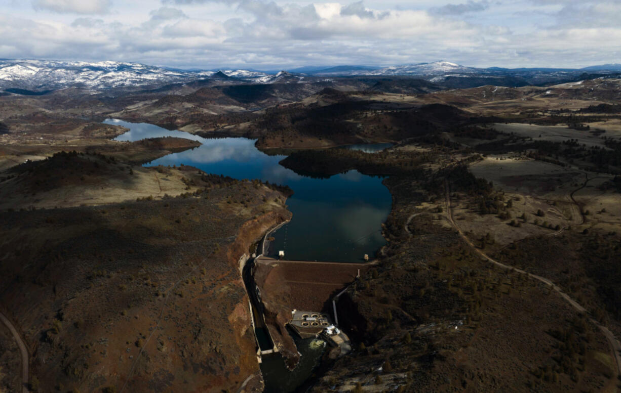 Water rushes from Iron Gate Dam on March 3, 2023. The removal of the dam will start in 2024.