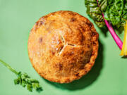 Chicken pot pie that brightens your day -- filled with bright vegetables and herbs.