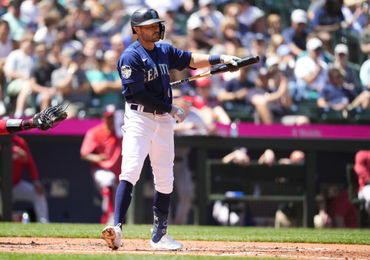 Seattle Mariners' AJ Pollock reacts to striking out against the Washington Nationals during the fifth inning of a baseball game Wednesday, June 28, 2023, in Seattle.