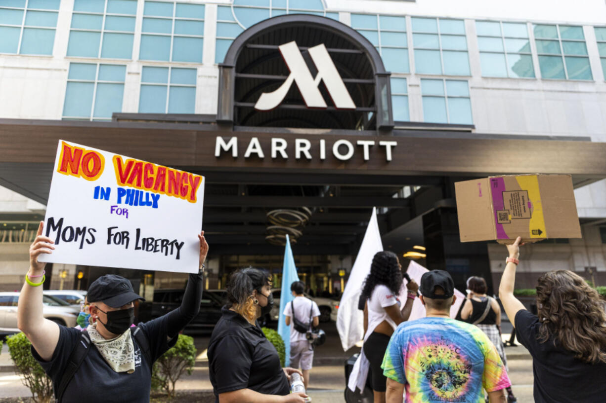 Protesters at the Marriott in Philadelphia in May, which is hosting Moms for Liberty's national summit this weekend.