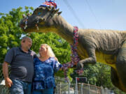 Marvin Horn and his wife, Daniyelle Finley, of Independence, Mo., are planning to move and have reluctantly put their beloved and oversized dinosaur for sale for $1,000.