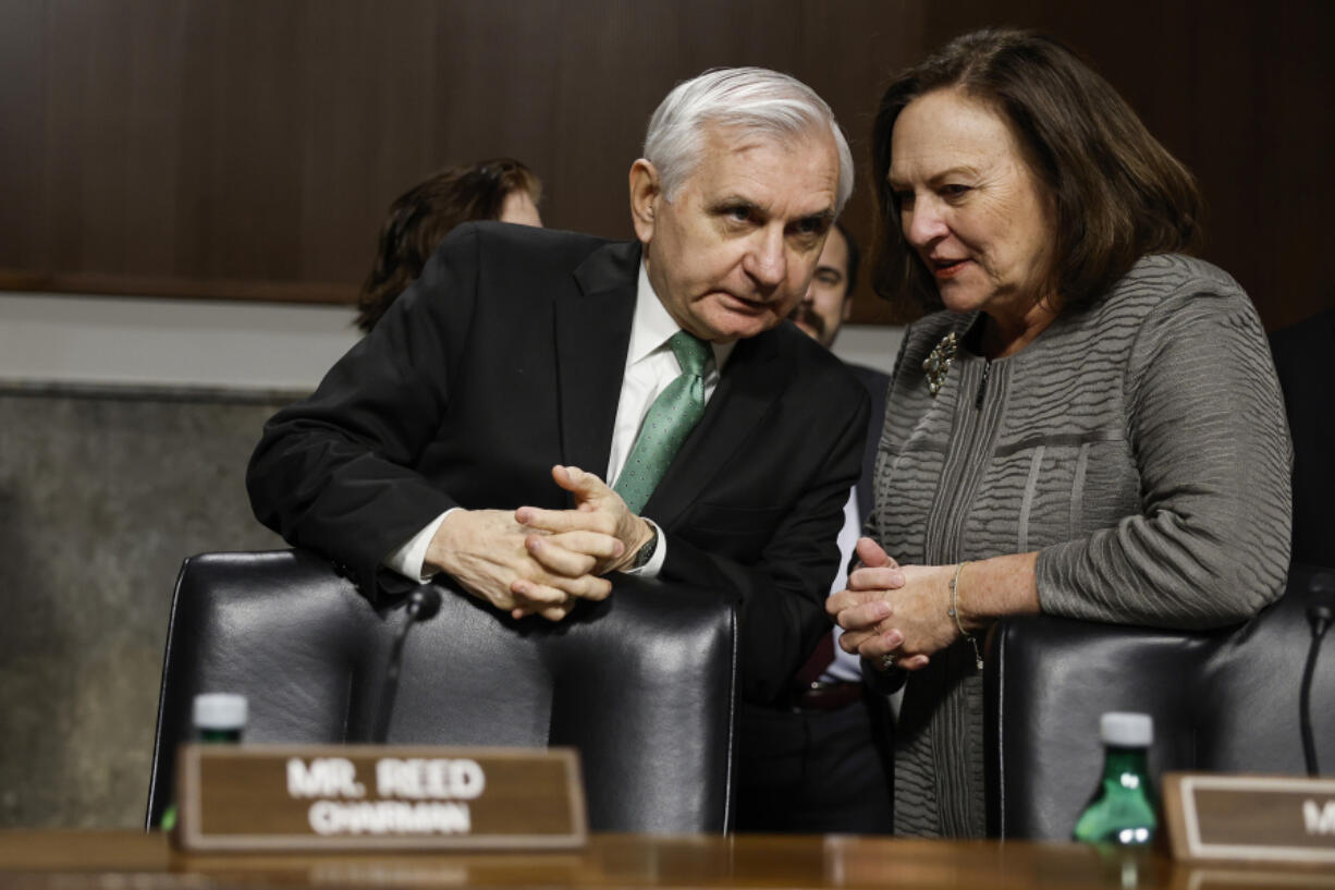 Senate Armed Services Committee Chairman Jack Reed (D-RI) speaks with Sen. Deb Fischer (R-NE) before a hearing with the Senate Armed Services Committee Hearing on Capitol Hill on Feb. 15, 2023, in Washington, D.C.