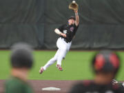 Raptors infielder Jackson Nicklaus makes a leaping catch at second base to try and get an out Friday, June 16, 2023, during the Raptors’ game against Cowlitz at the Ridgefield Outdoor Recreation Complex.