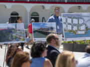 Renderings of the upcoming Terminal 1 development sit on easels during a press conference at Terminal 1 on the Vancouver waterfront.