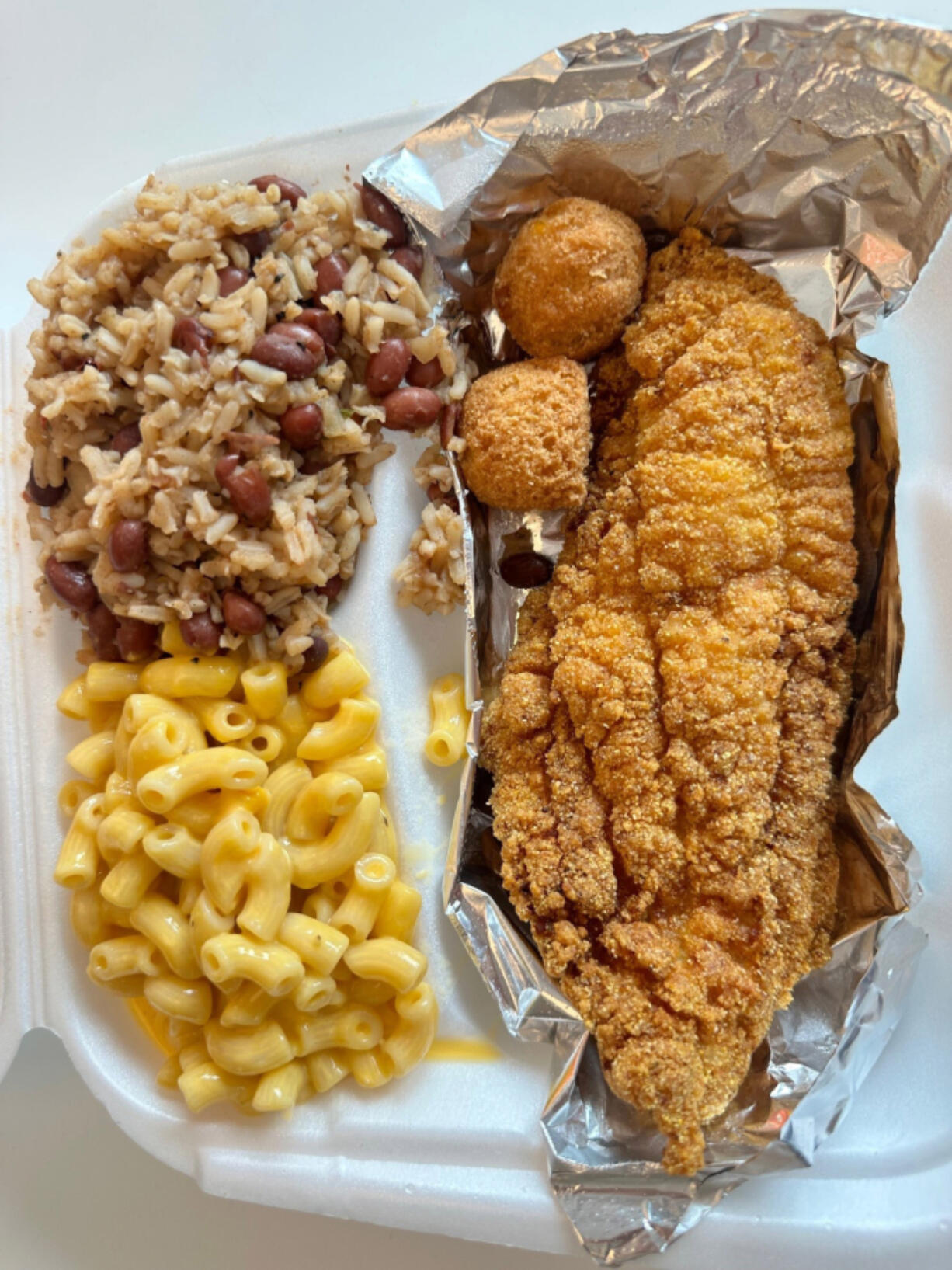 Fried catfish, mac and cheese, rice and peas from Krisey's Kitchen food cart in Vancouver.