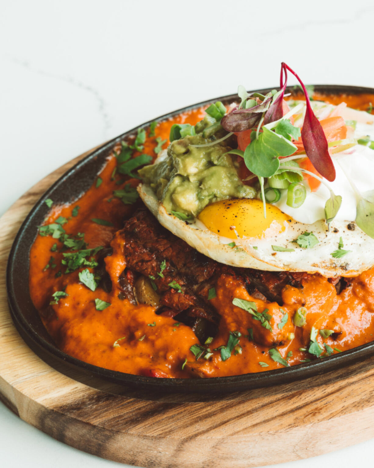 Vancouver waterfront hot spot Dos Alas offers a brunch menu that includes Steak Arrachera and Eggs.