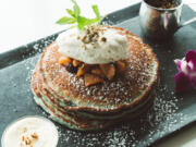 Dos Alas on the Vancouver waterfront now offers brunch, including these blue corn pancakes with apple and cherry agave compote, whipped butter and syrup.