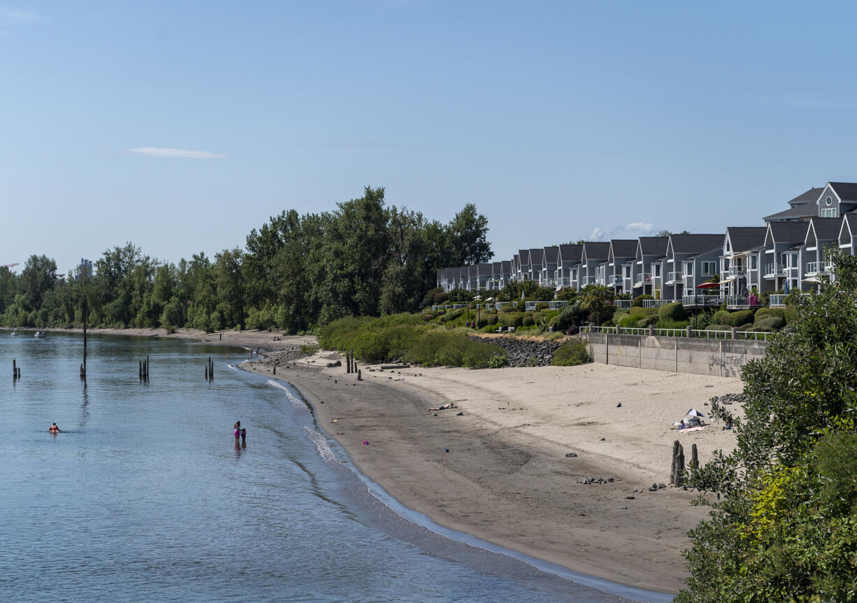 People recreate on Surprise Beach on Tuesday in Vancouver. The U.S. Drought Monitor reported in early June that 28 percent of the Pacific Northwest was in drought.