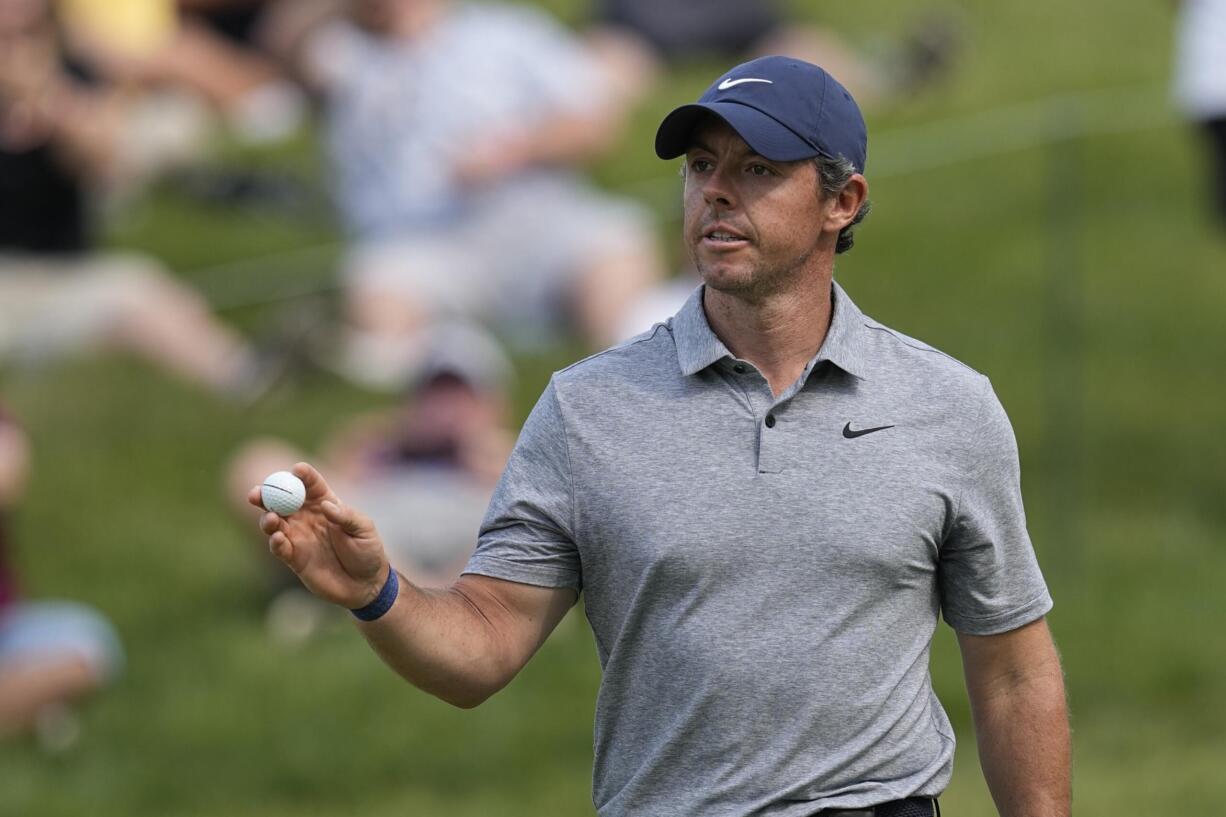 Rory McIlroy, of Northern Ireland, reacts after a birdie on the 17th hole during the third round of the Memorial golf tournament Saturday, June 3, 2023, in Dublin, Ohio.