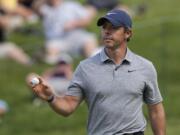 Rory McIlroy, of Northern Ireland, reacts after a birdie on the 17th hole during the third round of the Memorial golf tournament Saturday, June 3, 2023, in Dublin, Ohio.