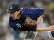 Seattle Mariners starting pitcher Logan Gilbert works against a San Diego Padres batter during the seventh inning of a baseball game Tuesday, June 6, 2023, in San Diego.