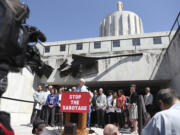 FILE - Democratic Sen. Jeff Golden speaks during a news conference and rally against the Republican Senate walkout at the Oregon State Capitol in Salem, Ore., June 6, 2023. Funding for schools, literacy programs and special education teachers in Oregon — a state where 60% of third graders are not reading at grade level — could be jeopardized by a Republican walkout that has stalled hundreds of bills and ground the Legislature to a partisan halt for over a month.