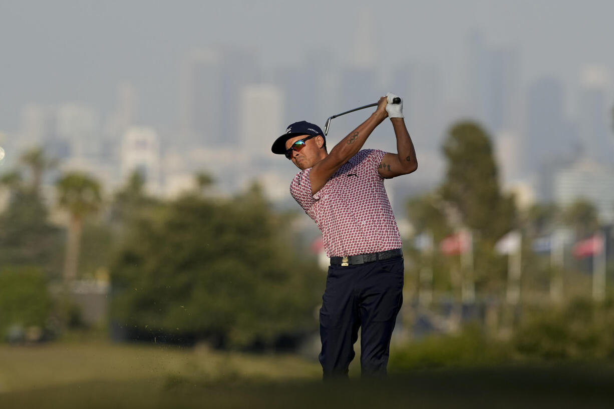 Rickie Fowler watches his tee shot on the 13th hole during the third round of the U.S. Open golf tournament at Los Angeles Country Club on Saturday, June 17, 2023, in Los Angeles.