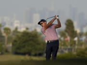 Rickie Fowler watches his tee shot on the 13th hole during the third round of the U.S. Open golf tournament at Los Angeles Country Club on Saturday, June 17, 2023, in Los Angeles.