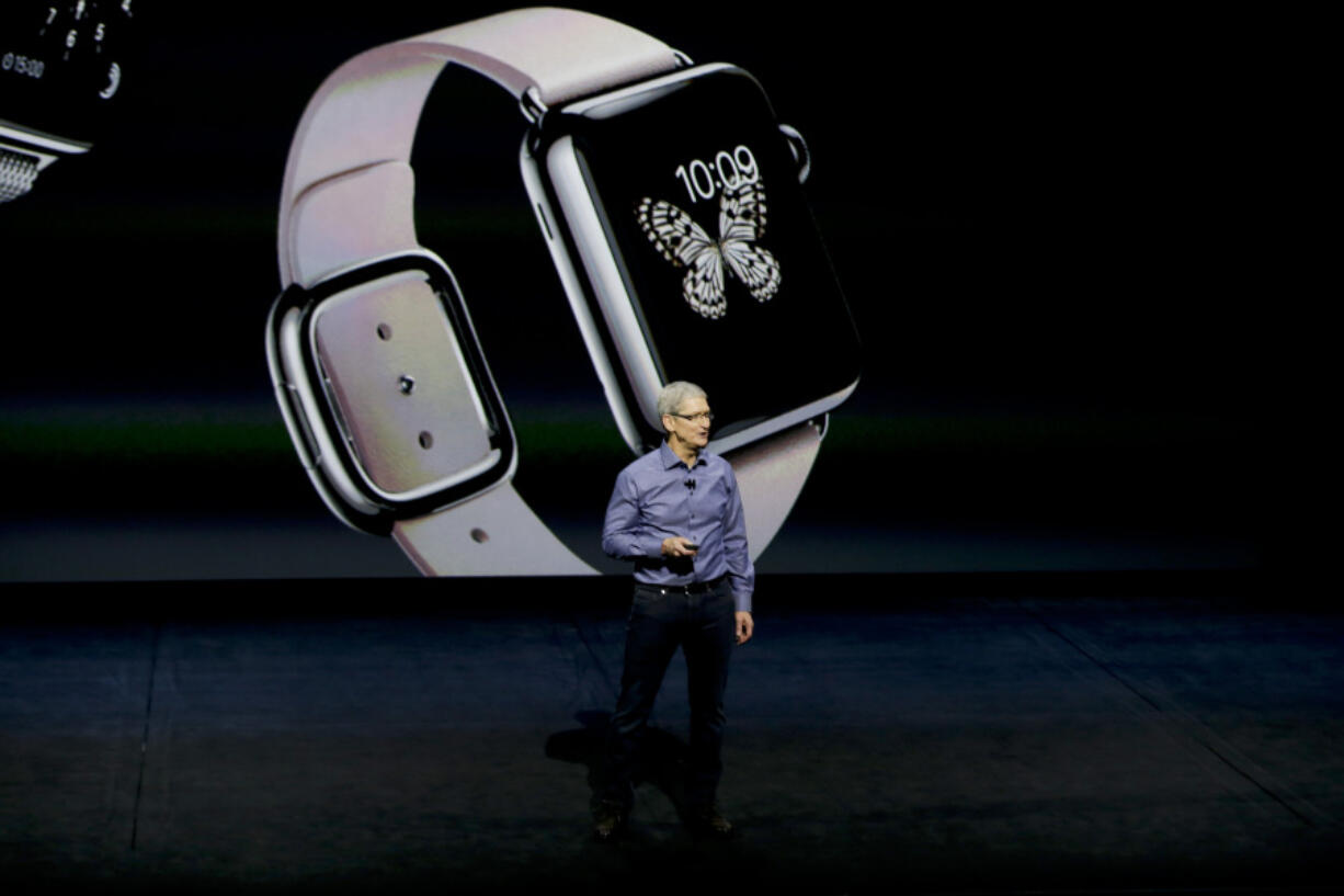 File - Apple CEO Tim Cook discusses the Apple Watch at the Apple event at the Bill Graham Civic Auditorium in San Francisco, Wednesday, Sept. 9, 2015. If Apple unveils a widely anticipated headset equipped with mixed reality technology on Monday, it will be the company's biggest new product since the introduction of the Apple Watch nearly a decade ago.