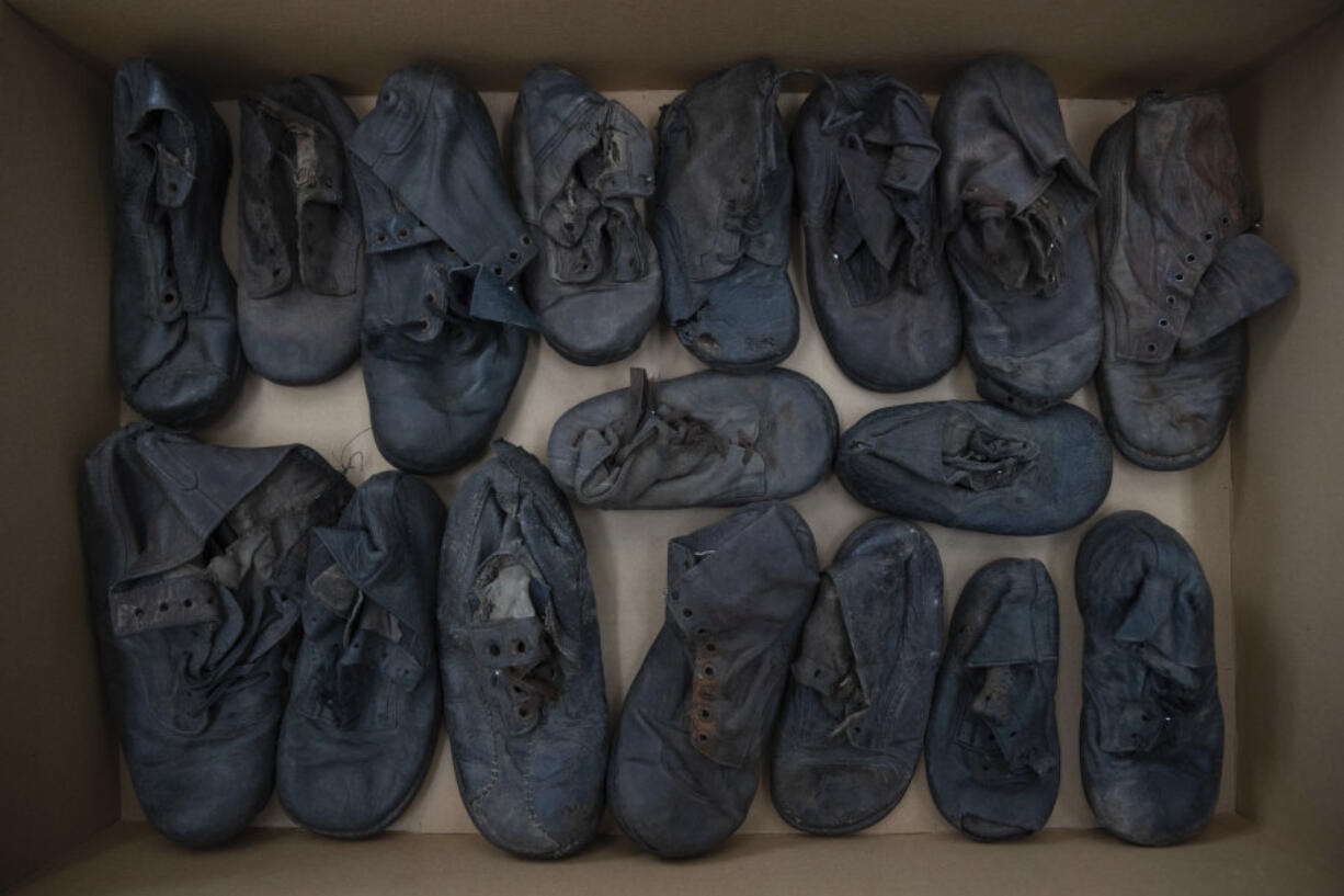 Shoes that belonged to child victims of the former Nazi German death camp Auschwitz-Birkenau lie in a box May 10 at the conservation laboratory on the grounds of the camp in Oswiecim, Poland.