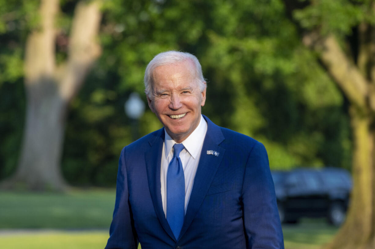 President Joe Biden smiles as he walks from Marine One upon arrival on the South Lawn of the White House, Thursday, June 1, 2023, in Washington. Biden is returning from Colorado.