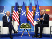 FILE - President Joe Biden, left, speaks with NATO Secretary General Jens Stoltenberg during a meeting at the NATO summit in Madrid, Spain on June 29, 2022. Biden is welcoming outgoing NATO Secretary-General Jens Stoltenberg to the White House on Monday, June 12, 2023, as the competition to find his successor to lead the military alliance heats up. Stoltenberg, who has led NATO since 2014 indicated earlier this year he would move on when his term expires at the end of September.