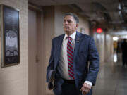 Rep. Andrew Clyde, R-Ga., walks to a closed-door meeting with Speaker of the House Kevin McCarthy, R-Calif., and fellow Republicans, at the Capitol in Washington, Tuesday, June 13, 2023. Last week, Clyde was at the center of protest of McCarthy's leadership as he and a dozen Republicans, mainly members of the House Freedom Caucus, brought the House to a standstill. Clyde is a gun store owner in Georgia and is a sponsor of a bill to reverse a Biden administration firearms-related regulation on so-called pistol braces, a stabilizing feature. (AP Photo/J.