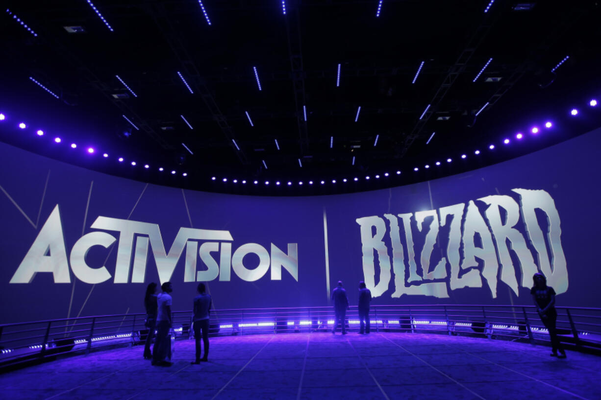 FILE - The Activision Blizzard Booth appears during the Electronic Entertainment Expo in Los Angeles on June 13, 2013. The release of "Diablo IV" is right around the corner. Early access for the highly anticipated action role-playing game begins Thursday night -- ahead of next week's official launch. "Diablo IV" marks the latest installment of Blizzard Entertainment's "Diablo" series. (AP Photo/Jae C.