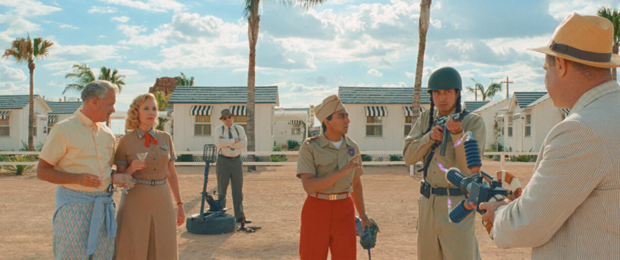 Tom Hanks, from left, Hope Davis, Tony Revolori and Liev Schreiber, right, in a scene from "Asteroid City." (Focus Features)