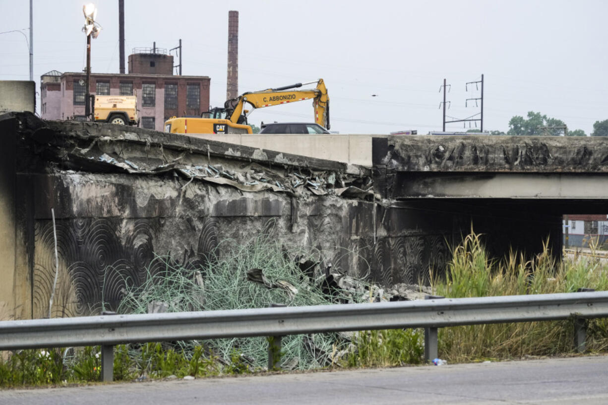 Show is the aftermath of an elevated section of Interstate 95 that collapsed, in Philadelphia, Monday, June 12, 2023.