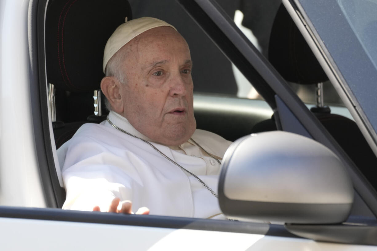 Pope Francis warrives at the Vatican, Friday, June 16, 2023, nine days after undergoing abdominal surgery. The 86-year-old pope was admitted to Gemelli hospital on June 7 for surgery to repair a hernia in his abdominal wall and remove intestinal scar tissue that had caused intestinal blockages.