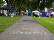 A message welcomes visitors to the Juneteenth Freedom Celebration at Esther Short Park in 2022. The annual event features food, live music, art, informational booths and games.