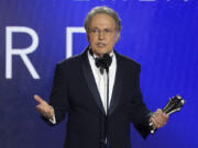 FILE - Billy Crystal accepts the lifetime achievement award at the 27th annual Critics Choice Awards on March 13, 2022, at the Fairmont Century Plaza Hotel in Los Angeles.