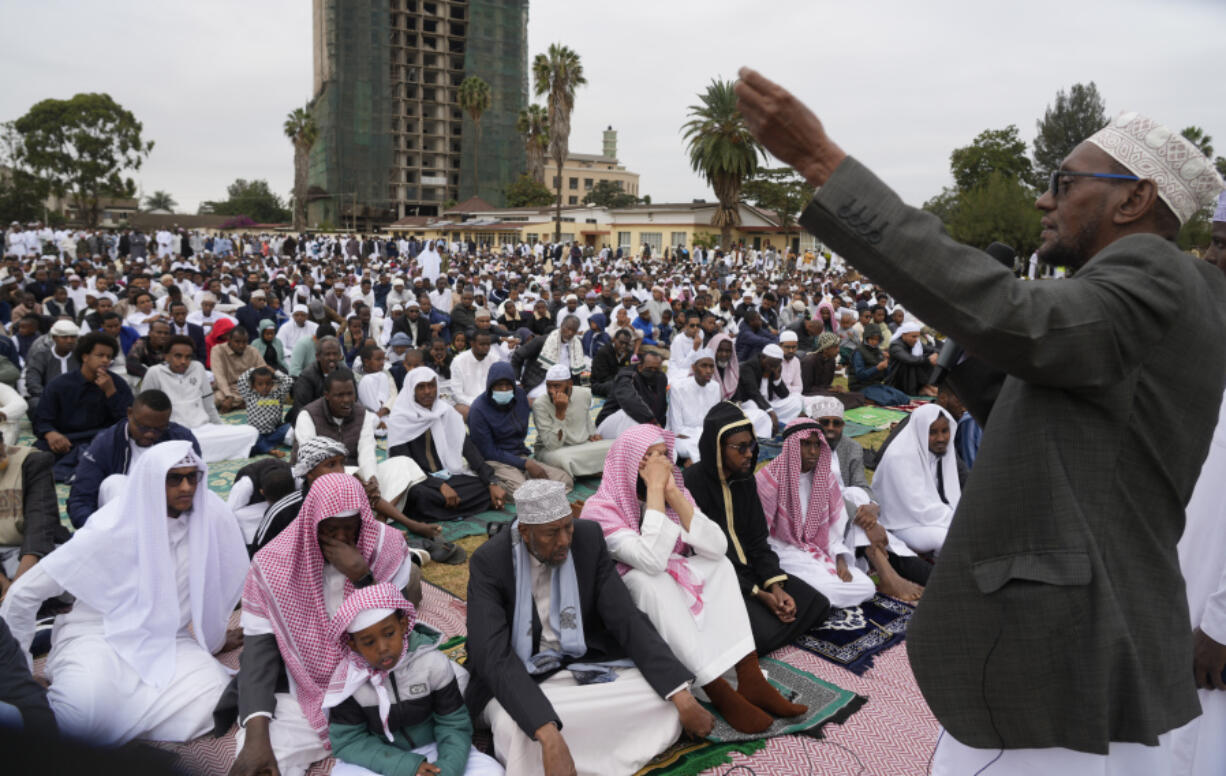 Imam delivers sermon as Muslims gather for prayers to celebrate Eid al-Adha, or Feast of Sacrifice, that commemorates the Prophet Ibrahim's faith, in Nairobi, Kenya, Wednesday, June 28, 2023. Eid al-Adha marks the end of hajj.