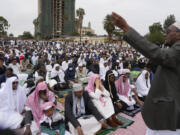 Imam delivers sermon as Muslims gather for prayers to celebrate Eid al-Adha, or Feast of Sacrifice, that commemorates the Prophet Ibrahim's faith, in Nairobi, Kenya, Wednesday, June 28, 2023. Eid al-Adha marks the end of hajj.