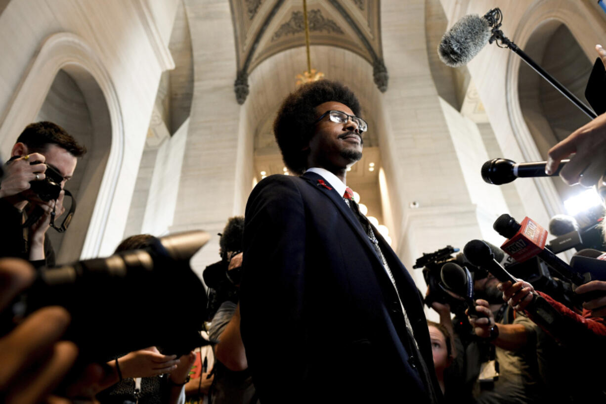 FILE - Justin Pearson, D-Memphis, takes questions as he arrives at the State Capitol in Nashville, Tenn., on April 13, 2023, after he was reappointed to the Tennessee House of Representatives. Lawmakers this year have kicked rival colleagues out of office in Tennessee and off the chamber floor in Montana. They have staged walkouts in Oregon and filibusters in Nebraska, where interactions are so fraught that some lawmakers say they're unsure they can work together anymore.