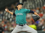 Seattle Mariners starting pitcher Logan Gilbert throws a pitch to the Baltimore Orioles during the second inning of a baseball game, Friday, June 23, 2023, in Baltimore.