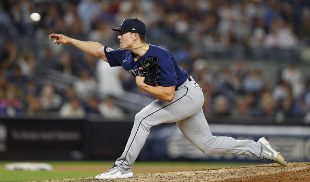 Seattle Mariners starting pitcher Bryan Woo throws against the New York Yankees during the sixth inning of a baseball game, Thursday, June 22, 2023, in New York. (AP Photo/Noah K.