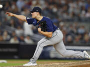 Seattle Mariners starting pitcher Bryan Woo throws against the New York Yankees during the sixth inning of a baseball game, Thursday, June 22, 2023, in New York. (AP Photo/Noah K.