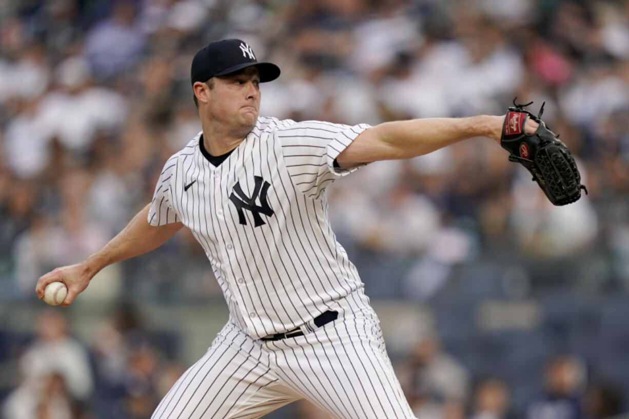 New York Yankees starting pitcher Gerrit Cole (45) throws in the first inning of a baseball game against the Seattle Mariners, Tuesday, June 20, 2023, in New York.