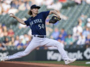 Seattle Mariners starter Bryce Miller delivers a pitch during the first inning of a baseball game against the Miami Marlins, Monday, June 12, 2023, in Seattle.