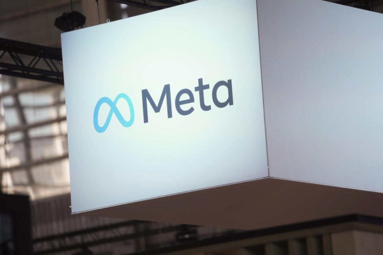 FILE - The Meta logo is seen at the Vivatech show in Paris, France, June 14, 2023. Instagram and Facebook's parent company Meta is adding new parental supervision tools and privacy features to its platforms beginning Tuesday, June 27. The changes come as social media companies face increased scrutiny over how they impact teens' mental health.