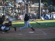 Ridgefield Raptors catcher Isaac Lovings swings at a pitch against the Portland Pickles on Tuesday, June 13, 2023 at Walker Stadium in Portland.