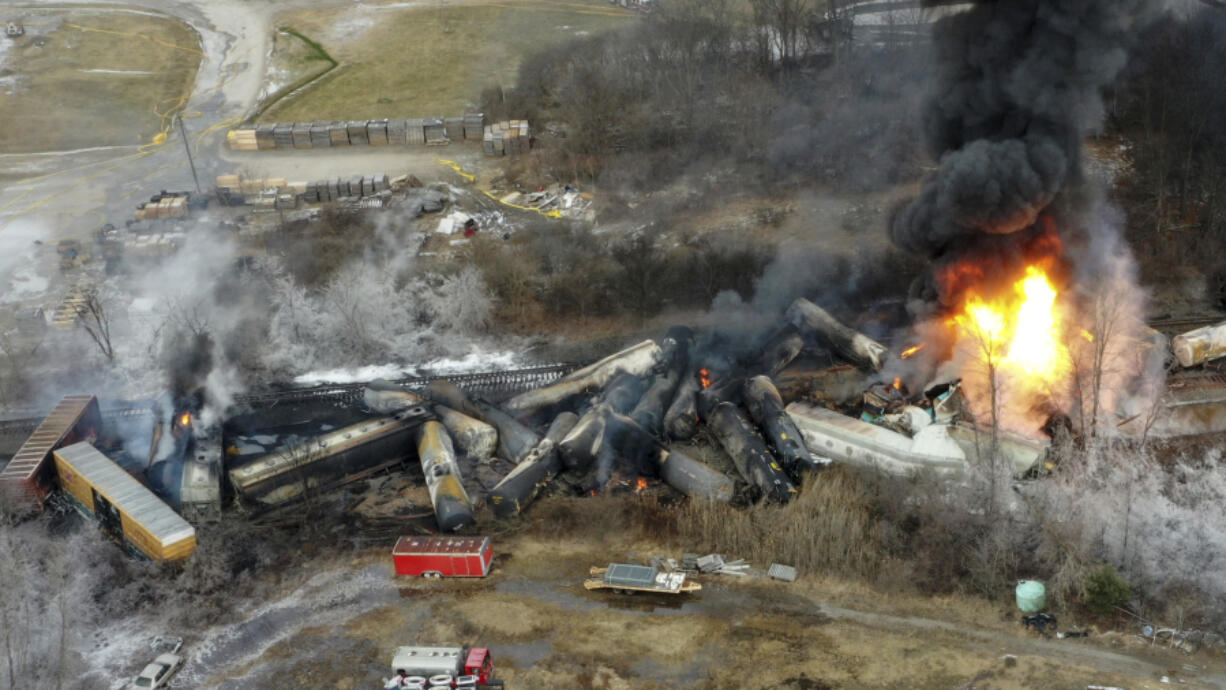 FILE - This photo taken with a drone shows portions of a Norfolk and Southern freight train that derailed the night before in East Palestine, Ohio, on Feb. 4, 2023. The Federal Railroad Administration recently completed a review of Norfolk Southern's safety culture done in the wake of the fiery Feb. 3 derailment in Ohio, and officials plan to follow up with similar investigations of all the major freight railroads over the next year. (AP Photo/Gene J.