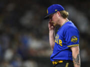 Seattle Mariners relief pitcher Gabe Speier is pulled during the eighth inning after giving up six runs to the Tampa Bay Rays in a baseball game Friday, June 30, 2023, in Seattle.