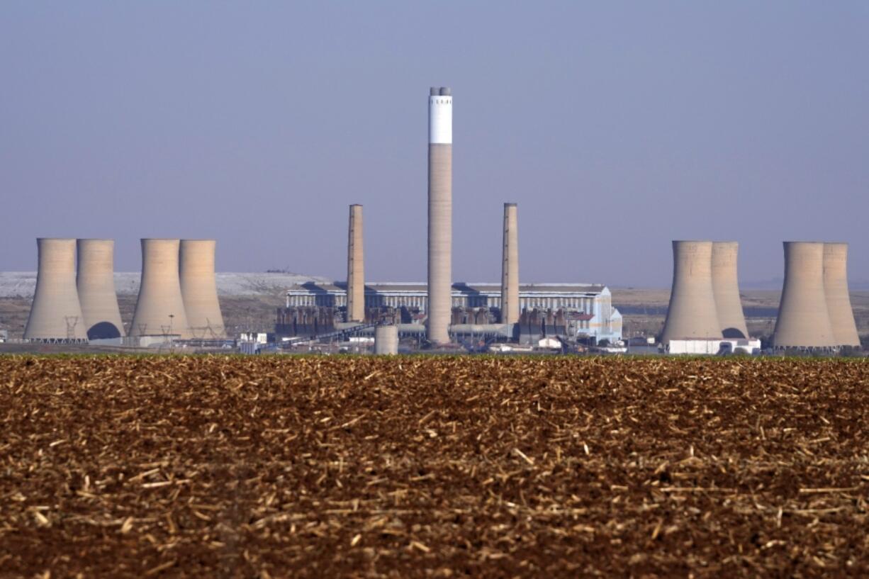 Komati Power Station is visible in Middelburg, South Africa, Monday, June 19, 2023. The coal-fired plant was shut down to make way for a solar, wind and battery storage plant.