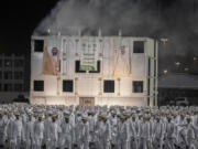 Banners showing Saudi King Salman, right, and Crown Prince Mohammed bin Salman are seen after a military parade in preparation for the annual Hajj pilgrimage, in the Muslim holy city of Mecca, Saudi Arabia, Wednesday, June 21, 2023. Muslim pilgrims are converging on Saudi Arabia's holy city of Mecca for the largest hajj since the coronavirus pandemic severely curtailed access to one of Islam's five pillars.