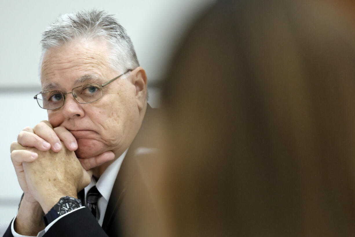 Former Marjory Stoneman Douglas High School School Resource Officer Scot Peterson looks in the direction of prosecutors during his trial at the Broward County Courthouse in Fort Lauderdale, Fla., on Thursday, June 15, 2023. Broward County prosecutors charged Peterson, a former Broward Sheriff's Office deputy, with criminal charges for failing to enter the 1200 Building at the school and confront the shooter as he perpetuated the Valentine's Day 2018 Massacre that left 17 dead and 17 injured.