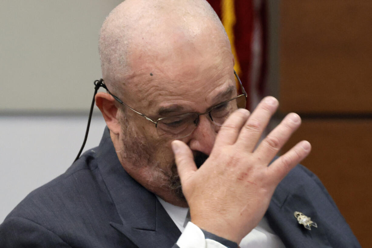 Broward Sheriff's Office Detective John Curcio becomes emotional while testifying during the trial of former Marjory Stoneman Douglas High School School Resource Officer Scot Peterson at the Broward County Courthouse in Fort Lauderdale, Fla., on Wednesday, June 21, 2023. Broward County prosecutors charged Peterson, a former Broward Sheriff's Office deputy, with criminal charges for failing to enter the 1200 Building at the school and confront the shooter.